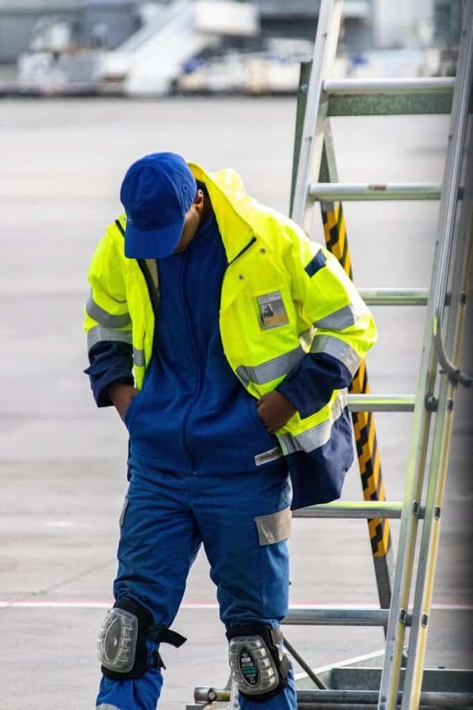 vehicle, man, safety, blue-collar worker, clothing, high-visibility clothing, person, people, construction worker, helmet, financial security, workwear, hardhat, industry, personal protective equipment, coat, gloves, outerwear, pants, adult, worker, machinery, face, outdoors, construction, workwear, workwear, workwear, workwear, workwear